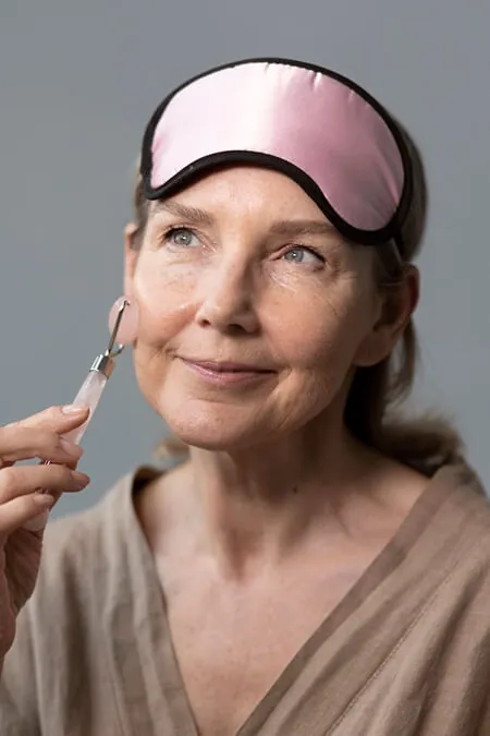 side view woman using massage tool 1
