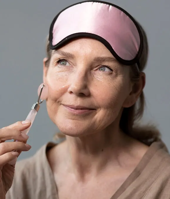 side view woman using massage tool 2 1